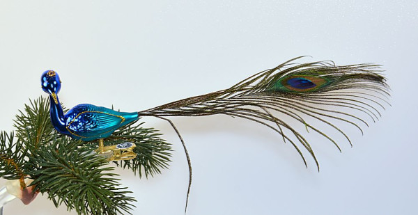 Pfau mit gedrehten Kopf blau Länge ca. 20 cm echte Pfauenfeder