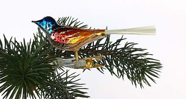 kleiner Vogel mit blauem Kopf und Glasschwanz Länge ca. 11cm Breite 2,5cm