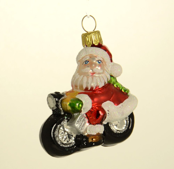 Weihnachtsmann auf Motorrad Höhe 6 cm  Breite 6 cm